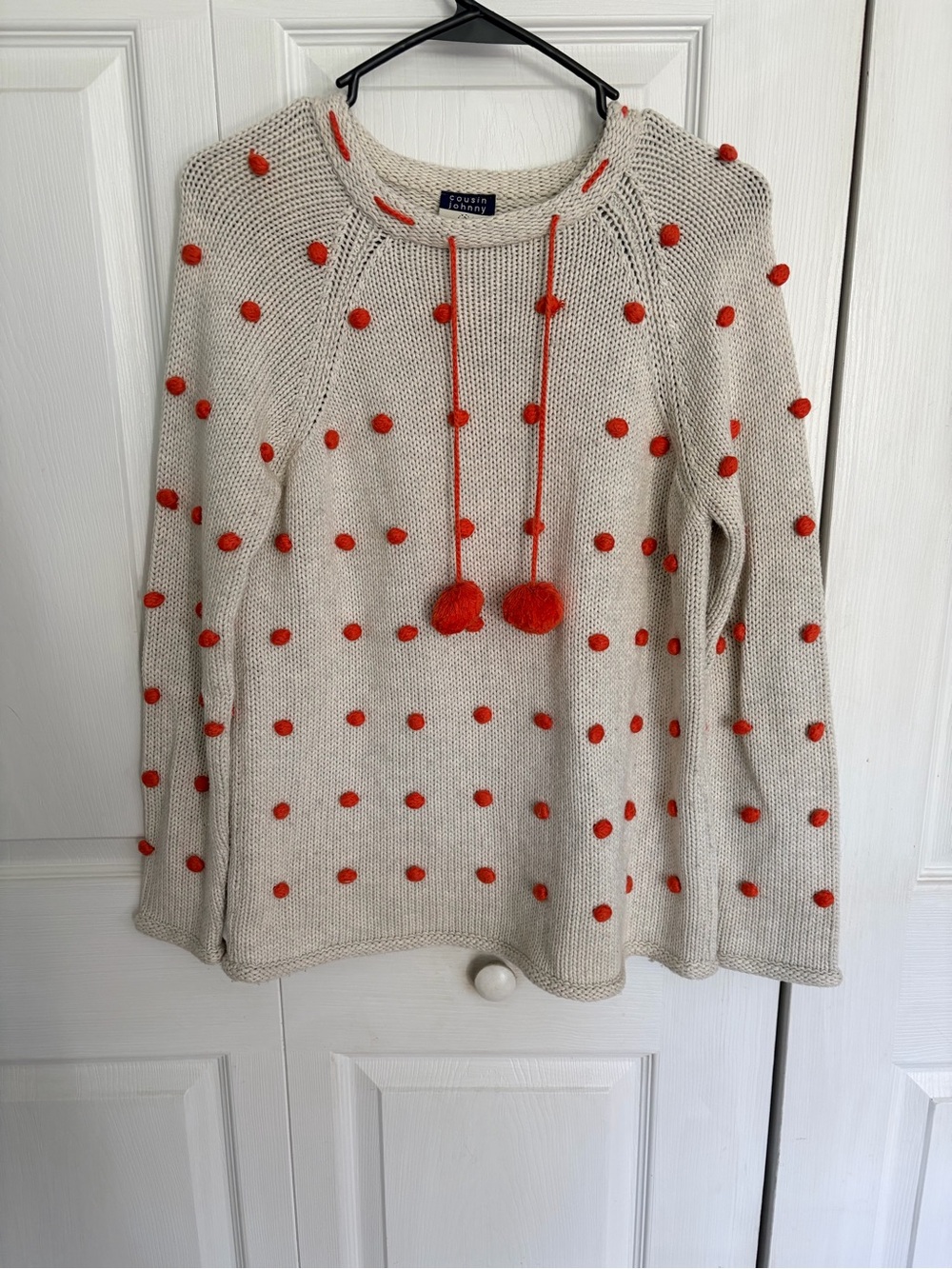 Cousin Johnny Cream Sweater with Orange Pom-Pom Details